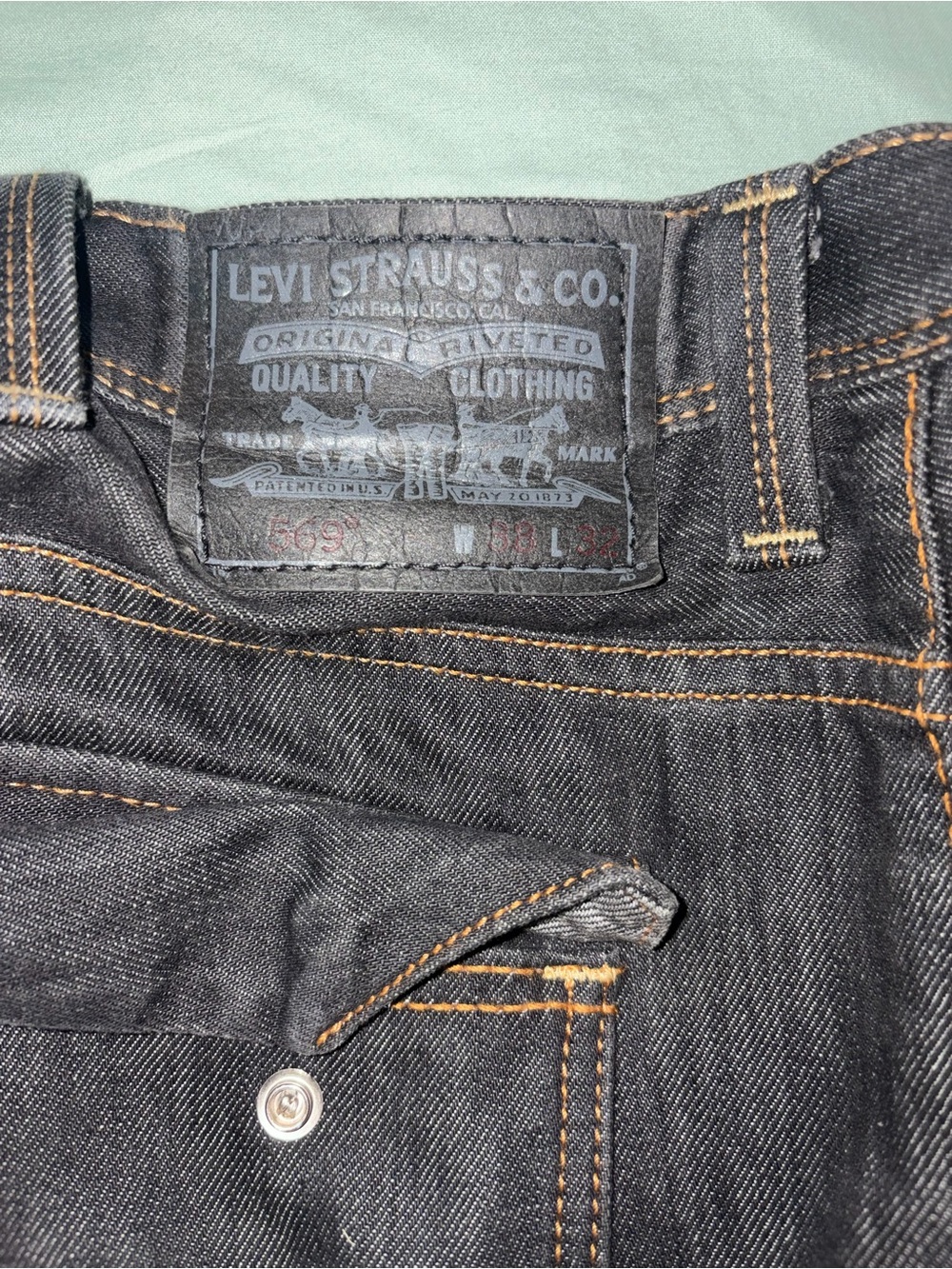 Levi's 569 Men’s Dark Blue Wash Slim Straight Jeans with Contrast Stitching